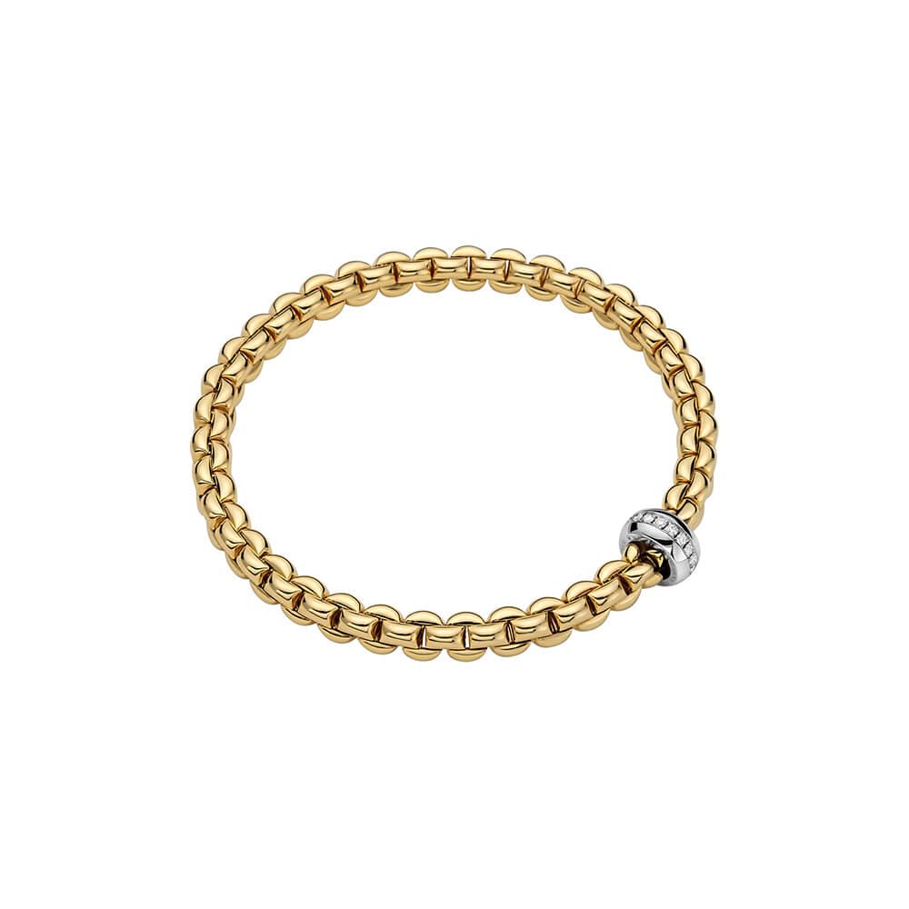 18K YELLOW GOLD "EKA" LINK BRACELET WITH SINGLE LINE DIAMOND RONDELL STATION TOTALING 0.15CTS