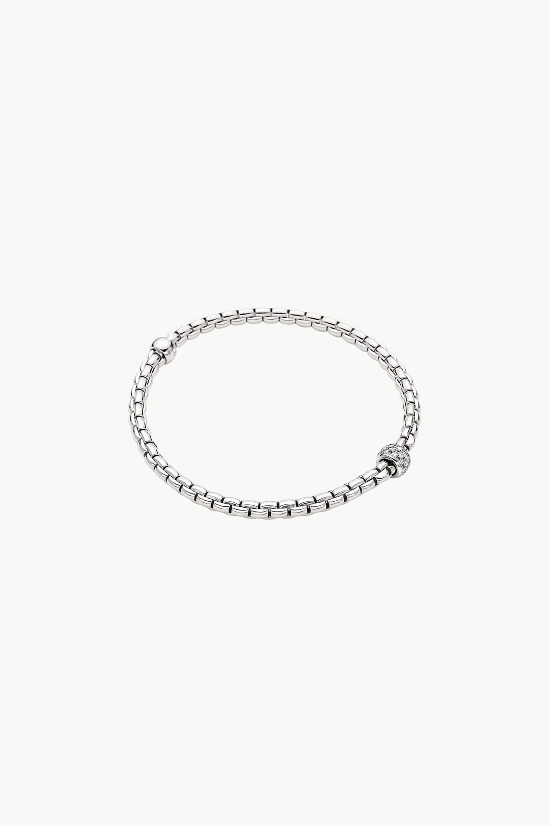 18K WHITE GOLD "EKA TINY" BRACELET WITH FULL PAVE DIAMOND RONDELL TOTALING 0.19CTS