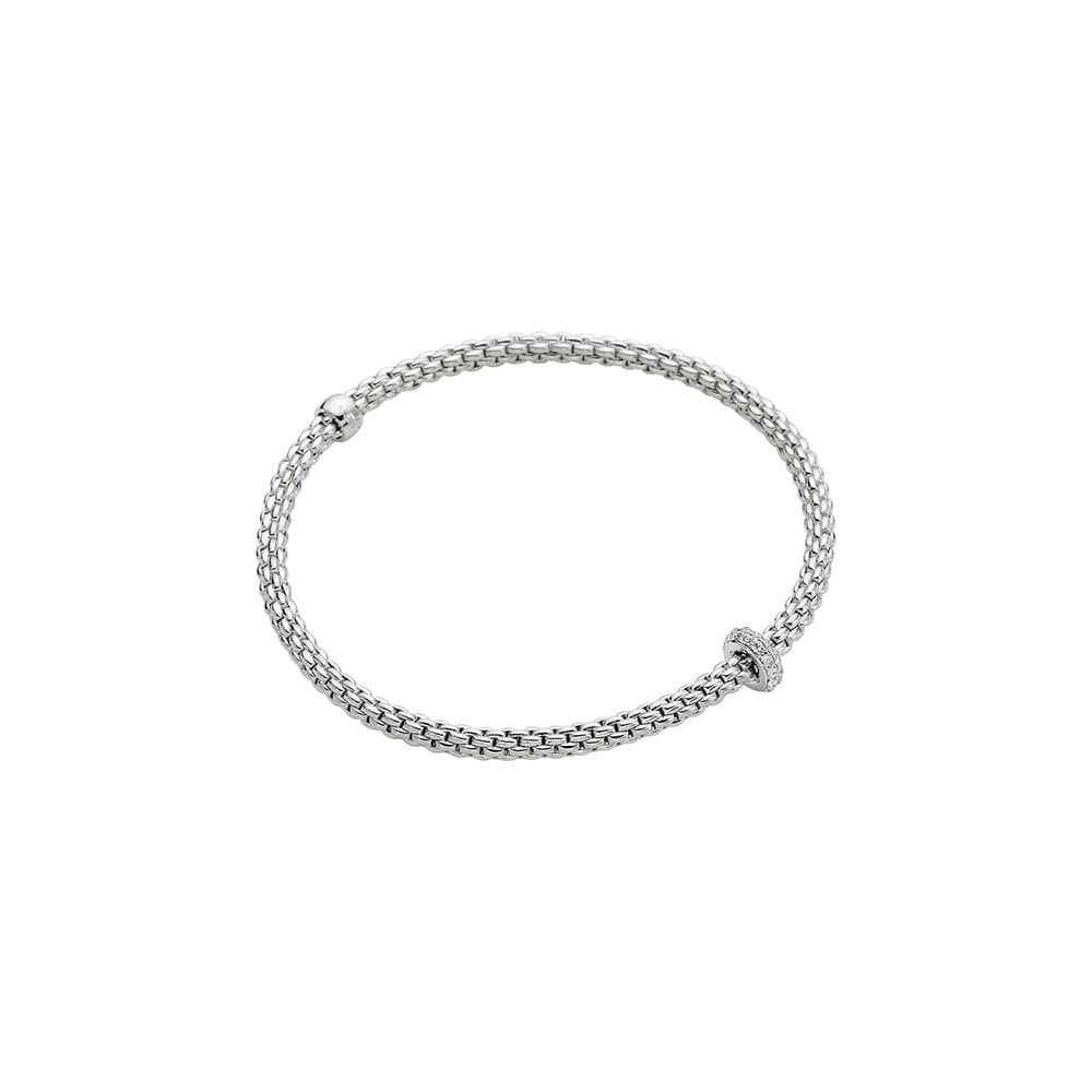 18K WHITE GOLD "PRIMA" STRETCH BRACELET WITH DIAMOND RONDELL TOTALING 0.18CTS