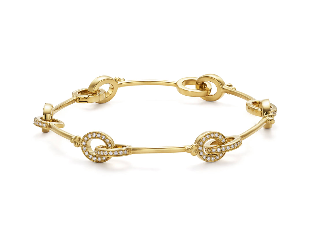 18K YELLOW GOLD ORSINA LINK BRACELET WITH PAVE SET DIAMONDS TOTALING 0.56CTS