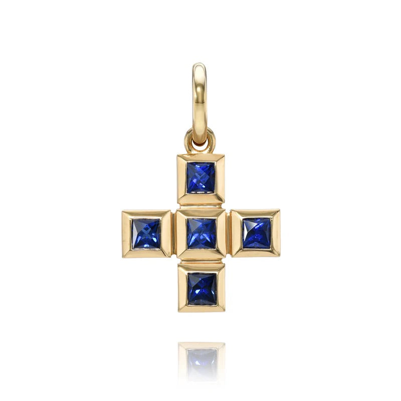 18k yellow gold Karina cross pendant containing French Cut Blue Sapphires totaling 1.48 carats.