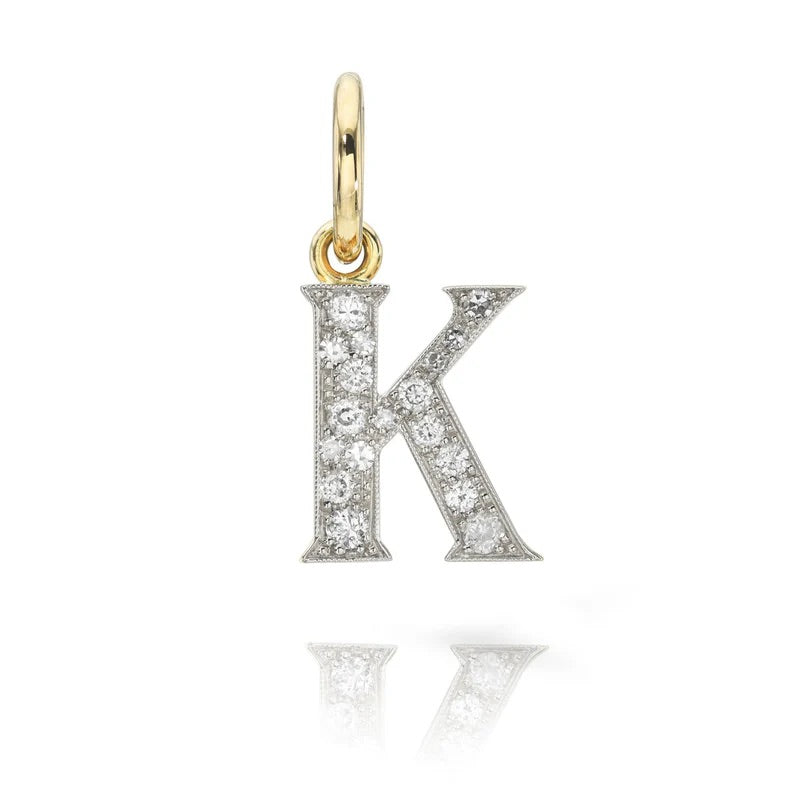 18k yellow gold and platinum initial K containing Old European diamonds totaling 0.26 carats.