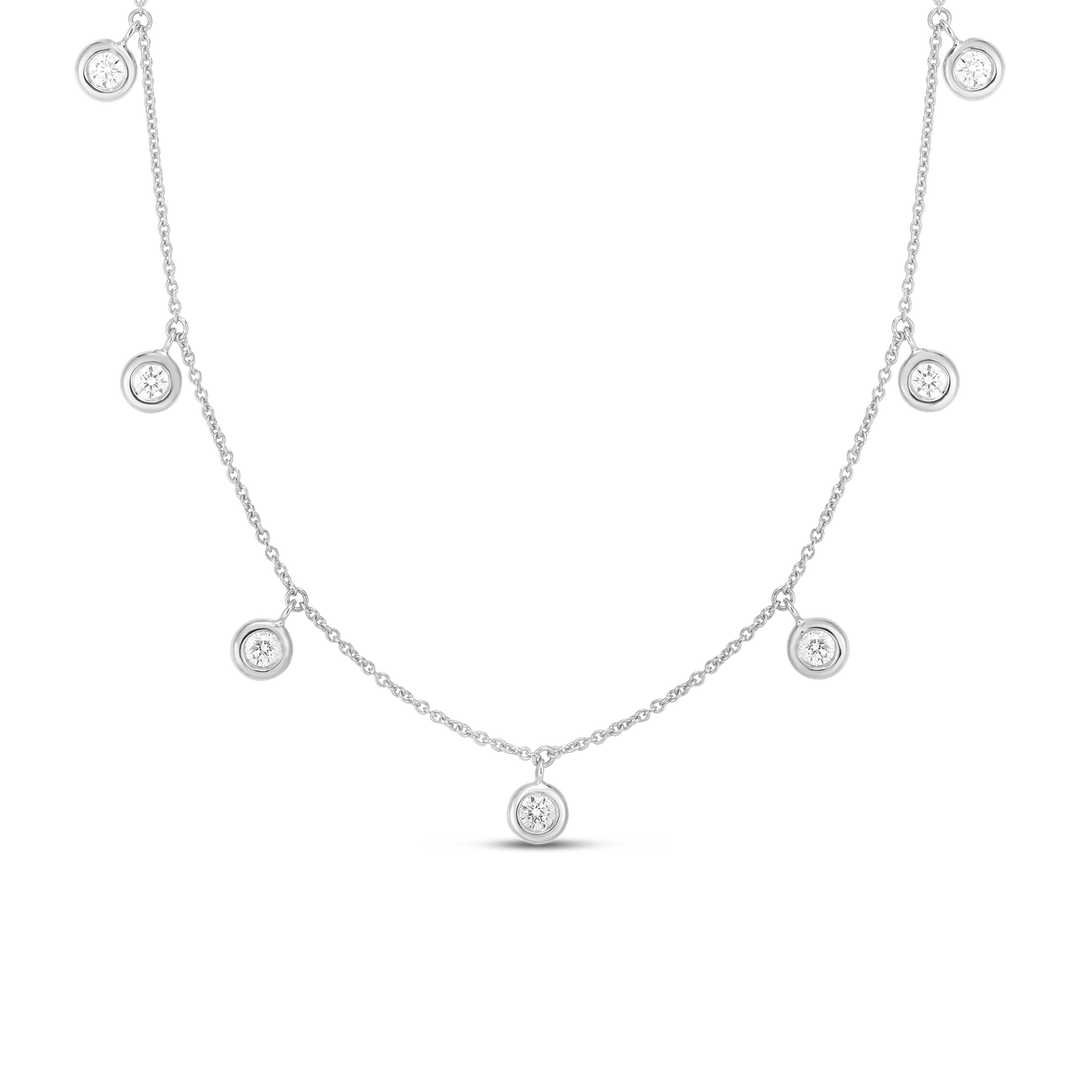 16-18" 18K WHITE GOLD 7 STATION DANGLE BEZEL SET DIAMOND NECKLACE WITH 7 ROUND DIAMONDS TOTALING 0.33CTS